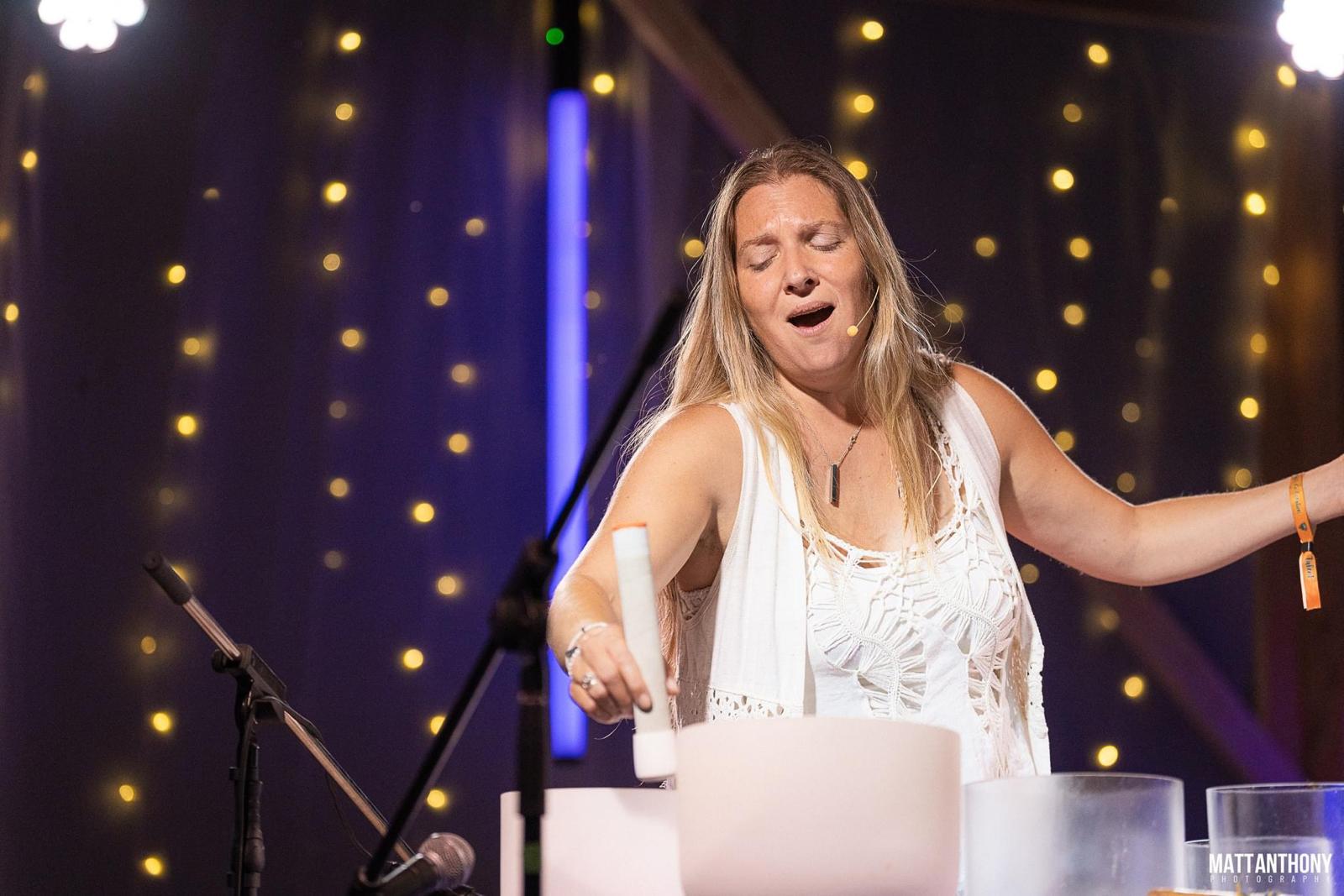 Theda Phoenix performing a crystal singing bowl sound meditation
